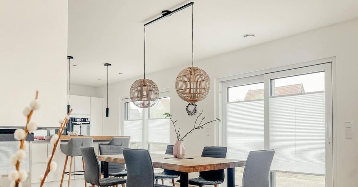 Stylish Lightswing twin matt black above dining table